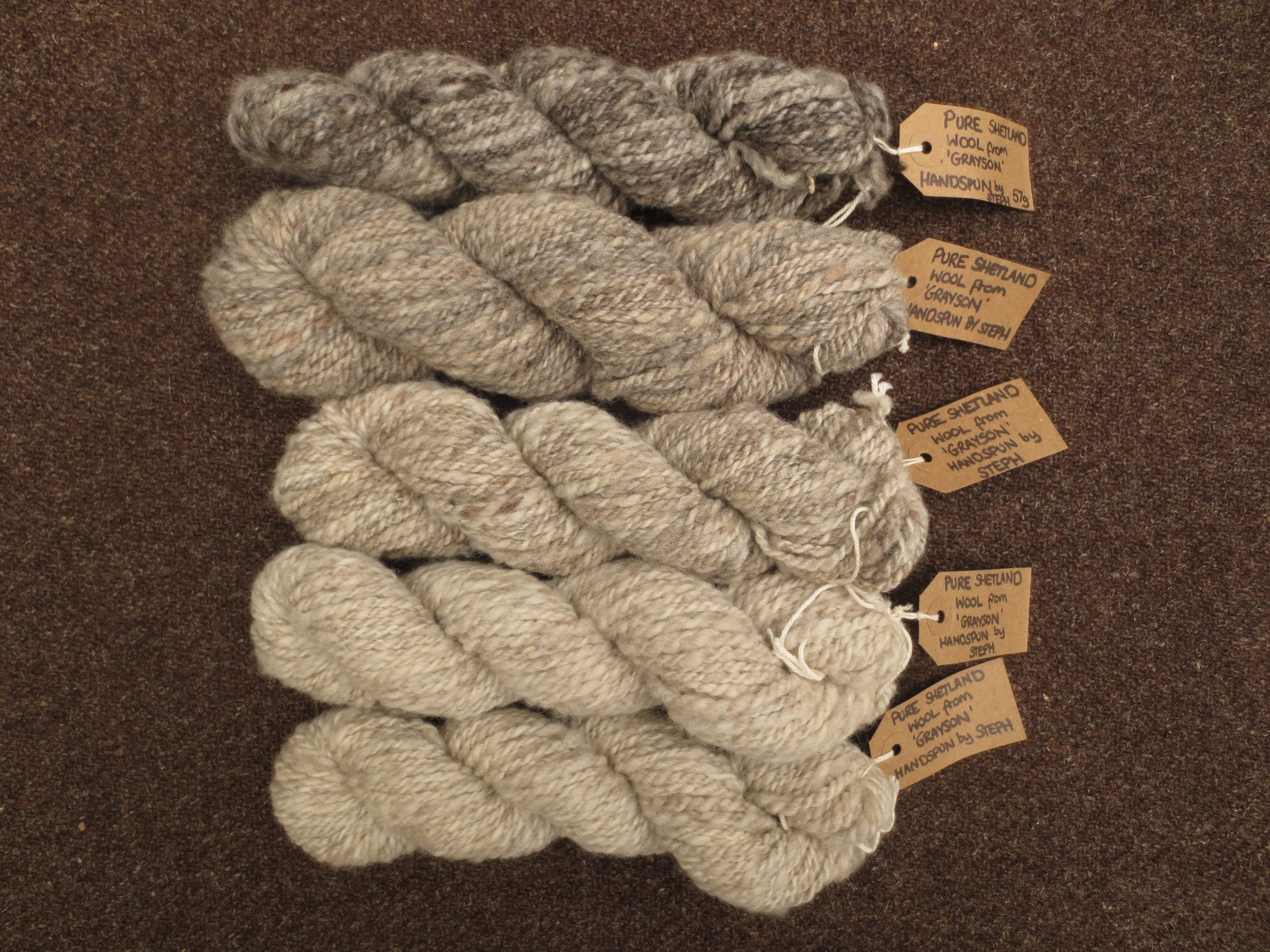 5 skeins of handspun yarn in natural greys