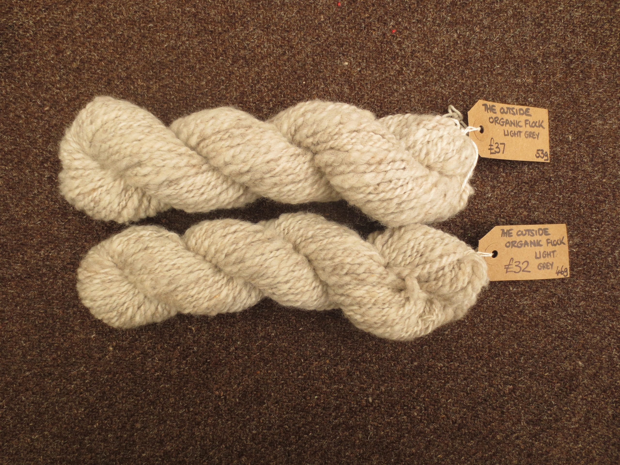 2 light grey skeins