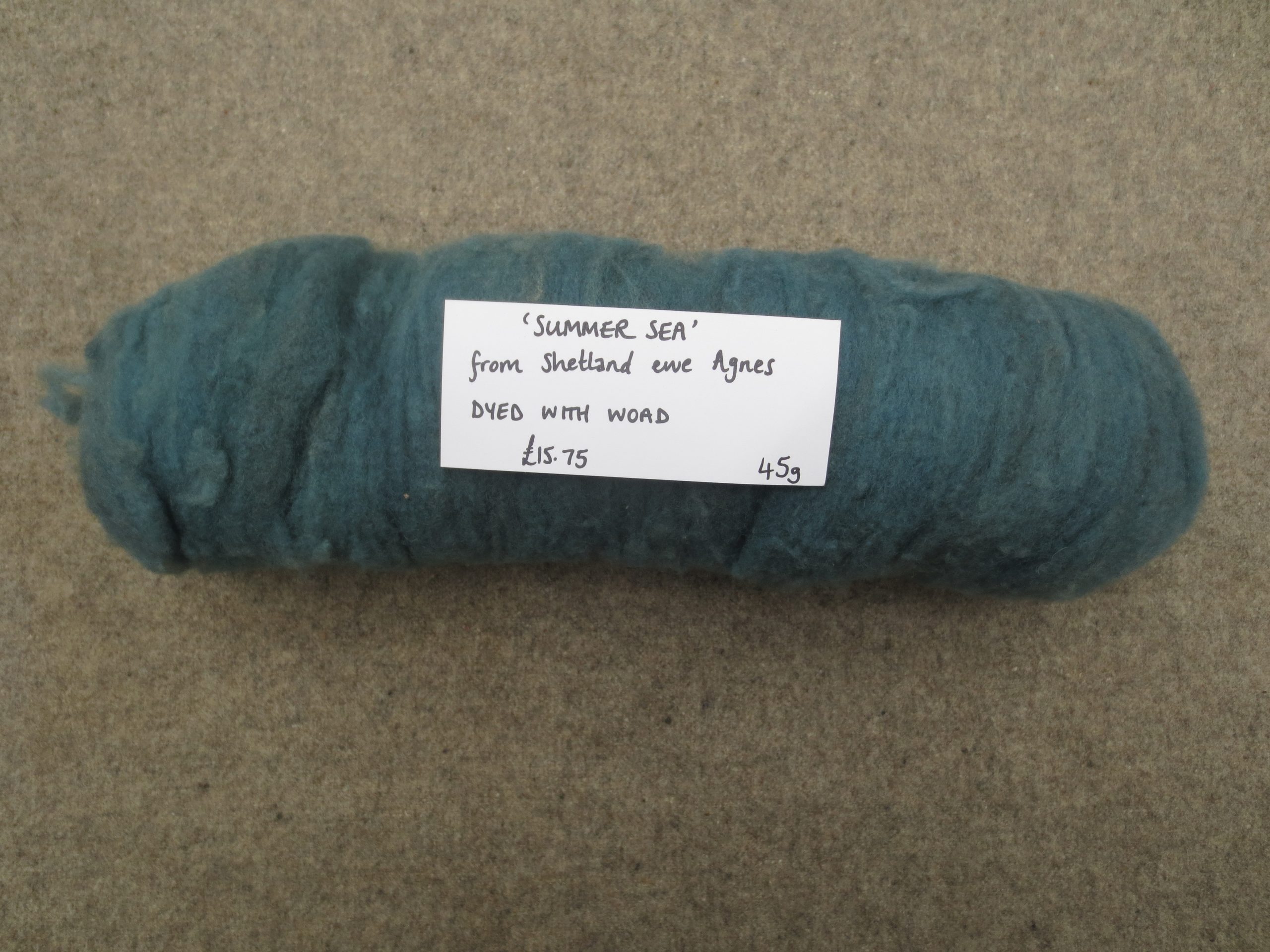 One rolled and labelled batt 'Summer Sea'