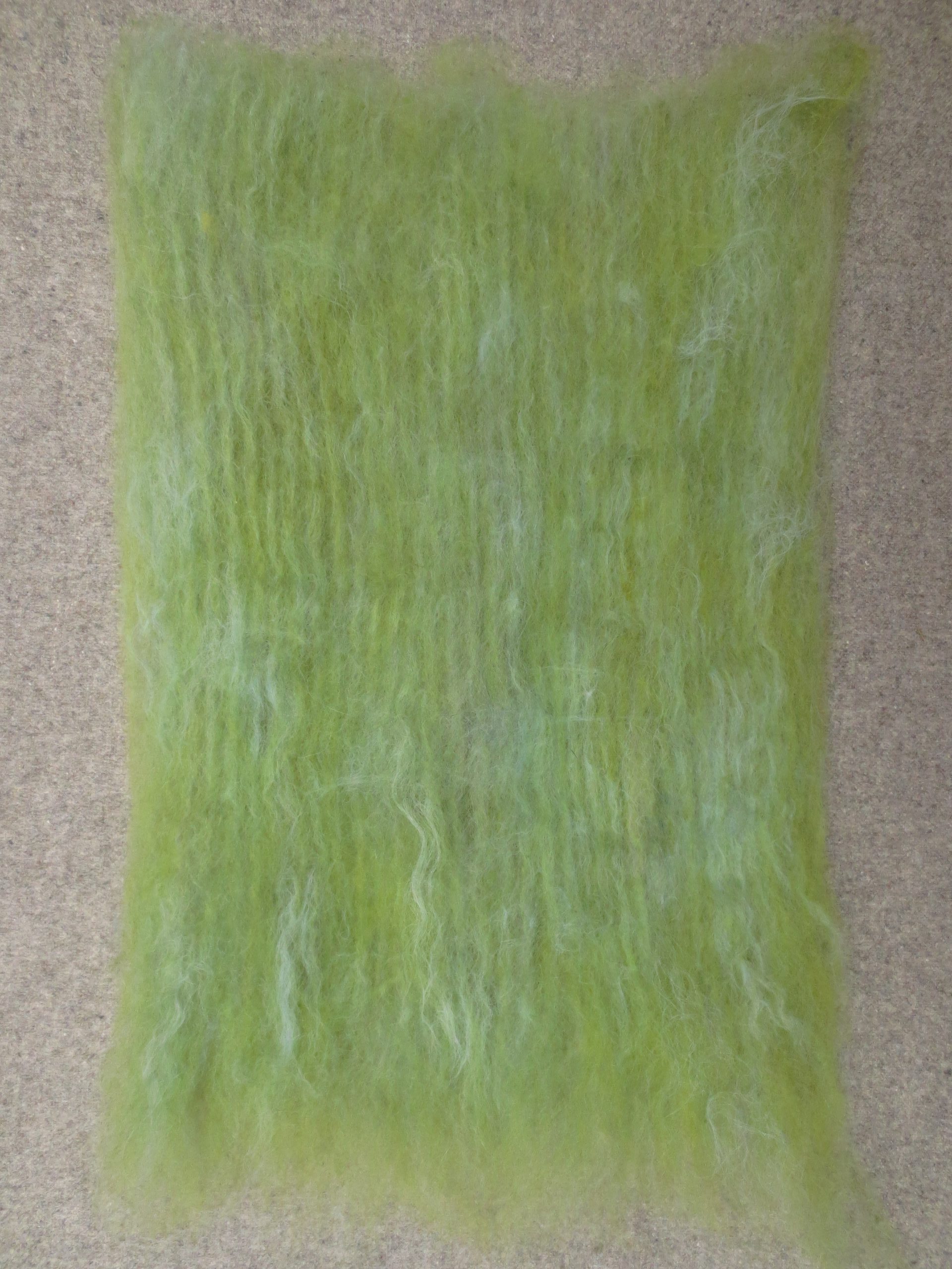 Green and turquoise carded batt unrolled